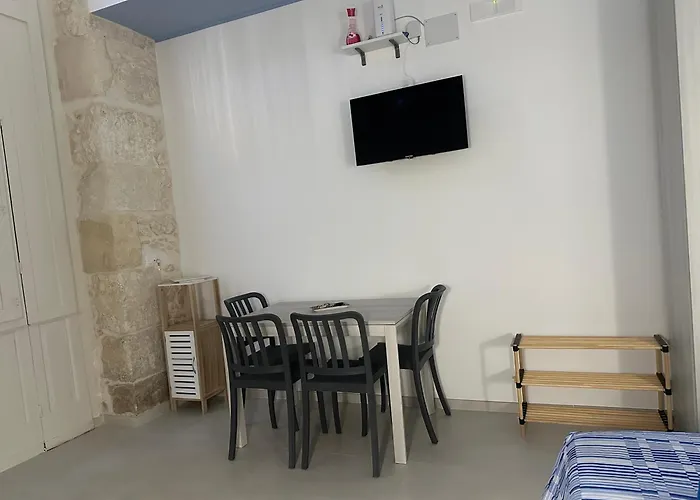 Апартаменты Moni House Ortigia *
